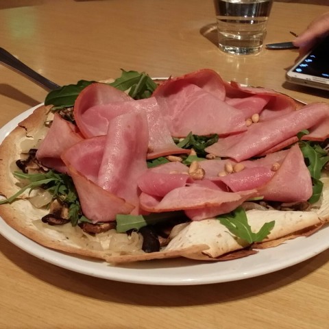thin crust pizza with black forest hamberliner